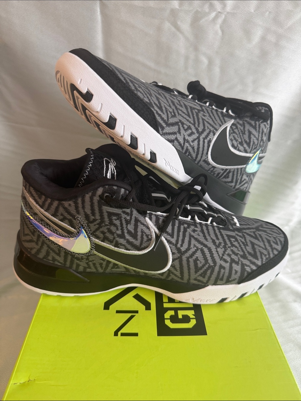 New! Nike Zoom LeBron NXXT Genisus in the 'Black' or 'Smoke Grey' colorway.